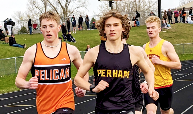 Viking Junior Charlie Larson ran shoulder to shoulder with Bjorn  Anderson (Perham) in the 1600m. Anderson is one of the top runners in the region, and Pelican’s Larson placed second with a time of 4:32.16.

PHOTO BY KI GOHDES