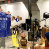 The greater Pelican Rapids lakes area displayed its support for the Minnesota-North Dakota Honor Flight program in resounding fashion on May 4, with a sold-out banquet at the Pelican VFW 5252 club. Pictured here are VFW Commander and auctioneer Rudy Butenas and VFW officer Dan Jongeward auctioning an Adam Thielen football jersey.